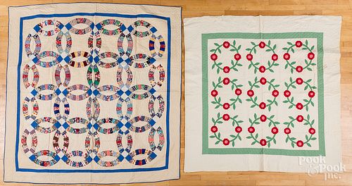 Rose wreath quilt, ca. 1900, and another quilt.