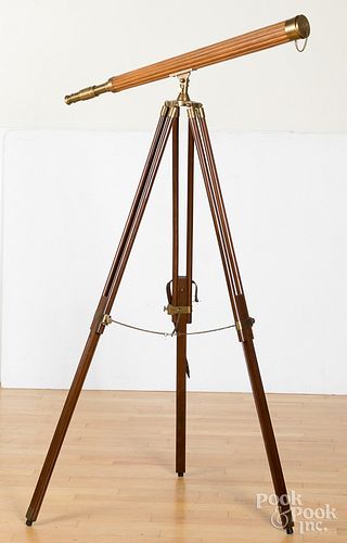 Brass telescope with tripod.