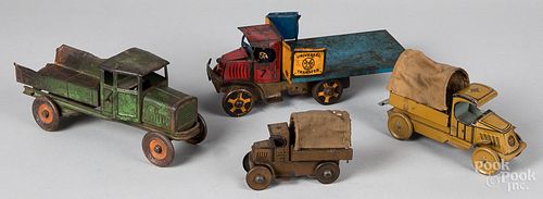 Five tin trucks