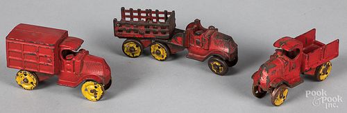Three Wallace Stewart cast iron Mack trucks