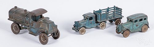 Three A. C. Williams cast iron vehicles