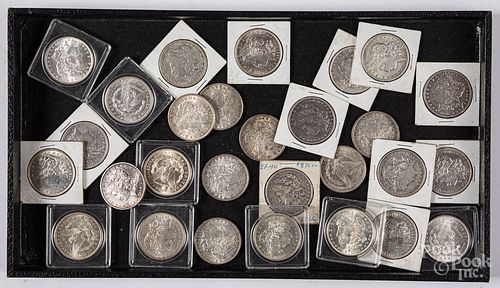 Twenty-nine Morgan silver dollars