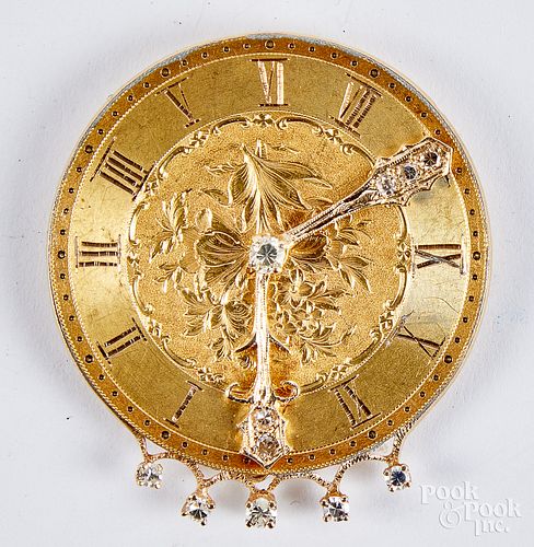 14K gold and diamond clock face brooch, 10.9 dwt.