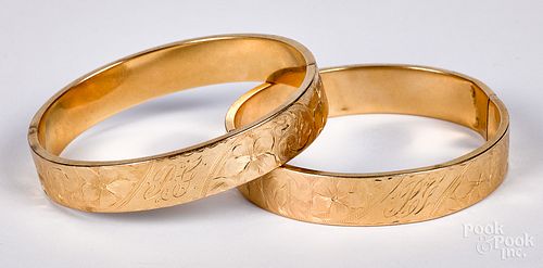 Two 14K gold bangle bracelets