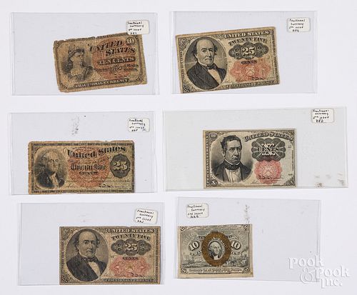 Six US fractional currency notes.