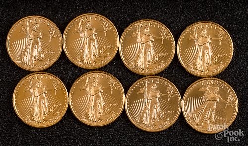 Eight 1/4 ozt. fine gold coins.