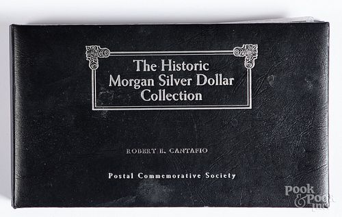 Ten silver dollars with commemorative stamps.