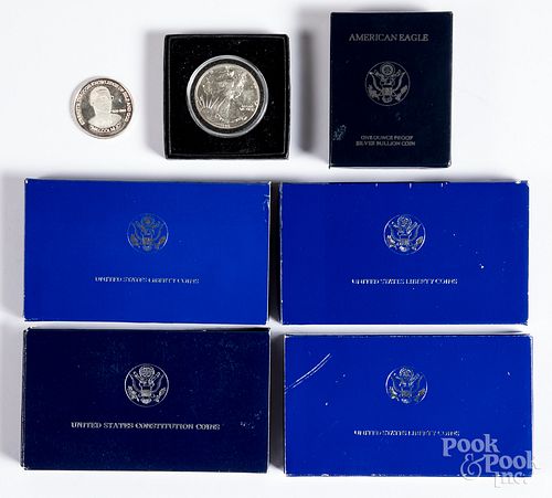 Three 1 ozt. fine silver coins, etc.