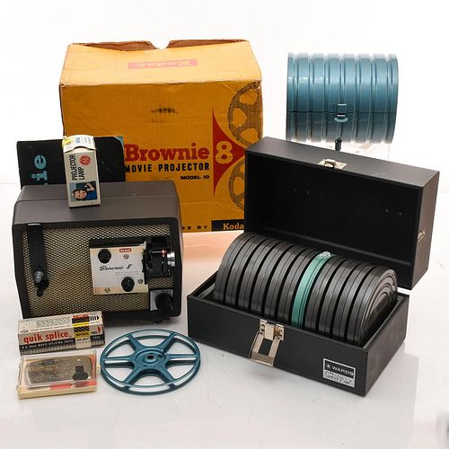 8 MILLIMETER HOME MOVIE PROJECTOR AND REELS