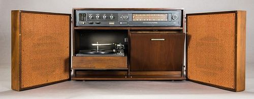 A Vintage G.E. Compact Stereo with Turntable and Speakers, 20th Century.
