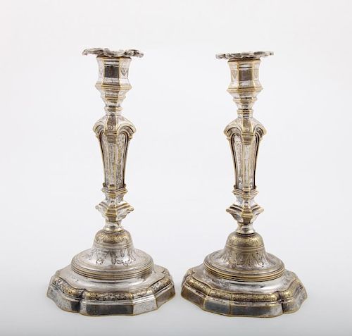 PAIR OF FRENCH REGENCE SILVERED BRASS CANDLESTICKS