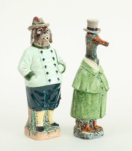 TWO AUSTRIAN MAJOLICA ANIMAL-FORM DECANTERS WITH HAT-FORM STOPPERS