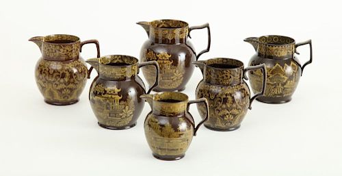 GROUP OF SIX STAFFORDSHIRE BROWN-GLAZED YELLOW TRANSFERWARE ADMIRAL NELSON" JUGS"
