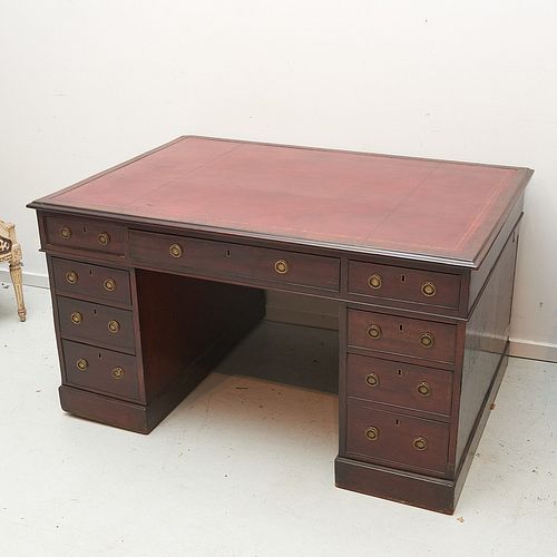 Antique English leather top partner's desk