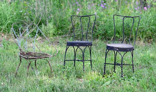 PAIR OF MINIATURE FRENCH BLACK PAINTED BISTRO CHAIRS