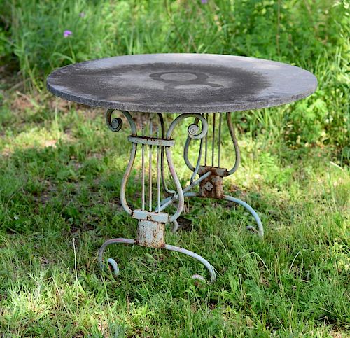 FRENCH PAINTED METAL AND CAST STONE GARDEN TABLE