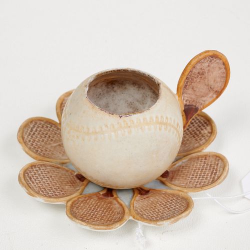 Unusual Locke & Co. porcelain tennis cup/saucer