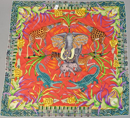 Hermès silk scarf "La Marche Du Zambeze" having animal print.