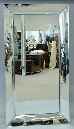 Philippe Starck Fiam mirror, "Caadre" with light and curved glass frame, 76 1/2" x 41".