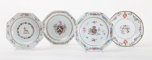 FOUR CHINESE EXPORT FAMILLE ROSE ARMORIAL OCTAGONAL PLATES