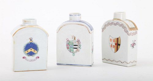 THREE CHINESE EXPORT FAMILLE ROSE ARMORIAL TEA CADDIES