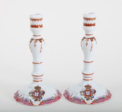 PAIR OF MODERN PORTUGUESE PORCELAIN FAMILLE ROSE ARMORIAL CANDLESTICKS, IN THE RÉGENCE STYLE