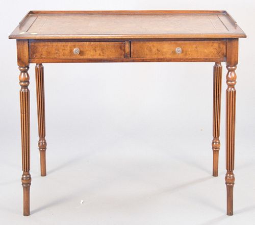 George IV style mahogany table with leather top, two drawers and gallery back and side, 29 1/2" h., top 19" x 36".