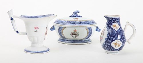 CHINESE EXPORT ARMORIAL PORCELAIN SAUCE TUREEN AND COVER AND A HELMET-FORM CREAMER, IN THE BLUE FITZHUGH PATTERN