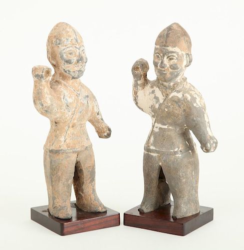 TWO SIMILAR WEI POTTERY FIGURES OF WARRIORS