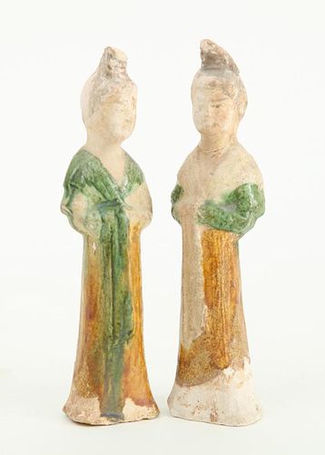 TWO SIMILAR TANG SANCAI-GLAZED POTTERY FIGURES OF FEMALE MOURNERS AND THREE SOUTHEAST ASIAN BRONZE BUDDHA HEADS