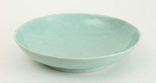 CHINESE ENGRAVED AND CELADON-GLAZED PORCELAIN FOOTED BASIN