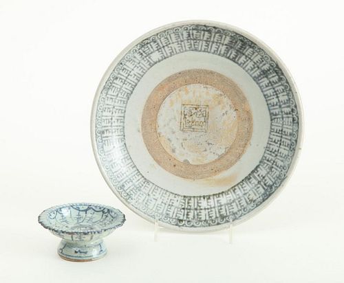 CHINESE PROVINCIAL BLUE AND WHITE PORCELAIN DISH AND A STEMMED SAUCE DISH