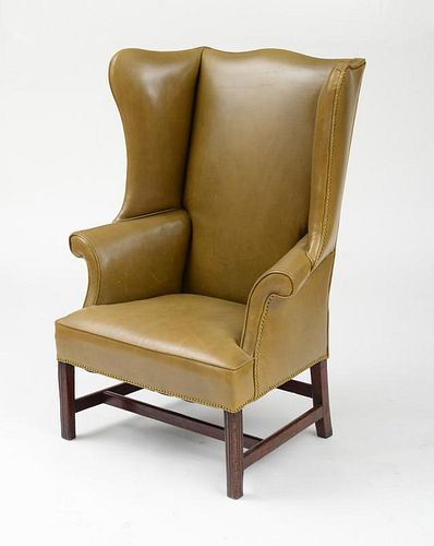 GEORGE III CARVED MAHOGANY WING ARMCHAIR