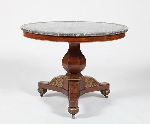 CHARLES X MAHOGANY AND PARCEL GILT CENTER TABLE