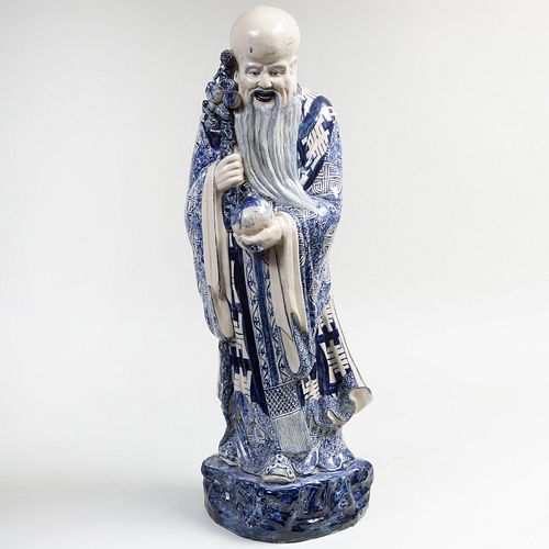 Chinese Blue and White Porcelain Figure of an Immortal