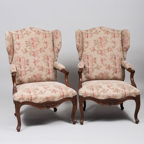 Pair of RÃ¨gence Style Carved Beechwood Wing Chairs