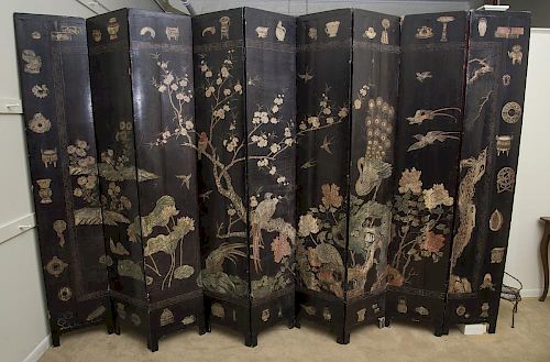 CHINESE CARVED BLACK LACQUER COROMANDEL TWELVE-FOLD SCREEN