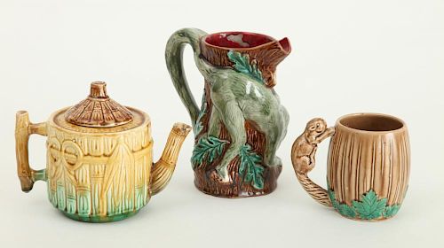 FRENCH MAJOLICA MONKEY-CLIMBING-ON-TRUNK PITCHER AND TWO OTHER MAJOLICA PITCHERS