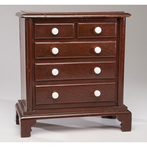 A Miniature Chest of Drawers