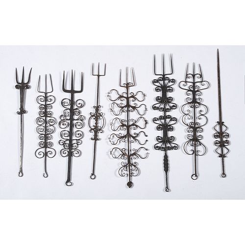 Fourteen Wrought Iron Butcher's Forks and Hooks