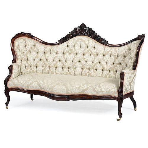 A Rococo Revival Carved Rosewood Sofa