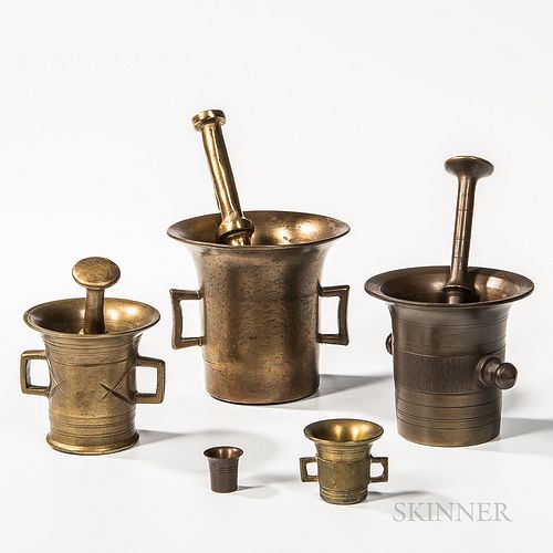 Three Brass Mortar and Pestles and a Small Mortar