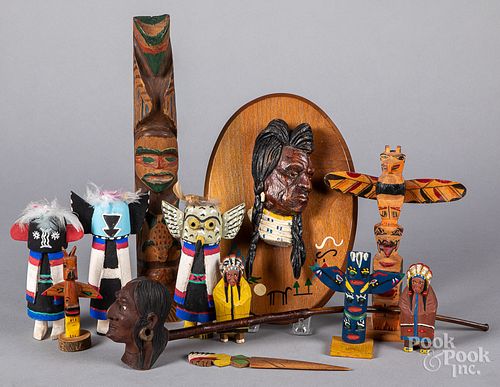 Twelve Native American Indian themed wood carving