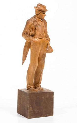 AMERICAN SCHOOL (20TH CENTURY) CARVED FIGURE OF A MAN