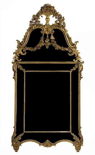 * A Regence Style Gilt Gesso Mirror Height 53 1/2 x width 40 inches.
