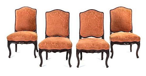 * A Set of Four Louis XV Walnut Side Chairs Height 37 inches.