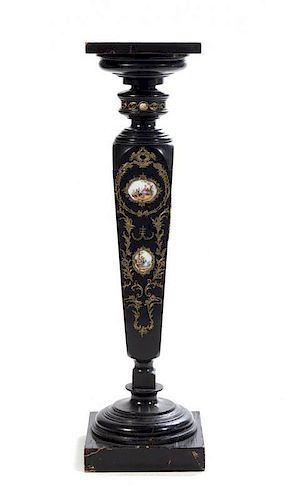 A Gilt Metal and Porcelain Mounted Ebonized Pedestal Height 43 inches.