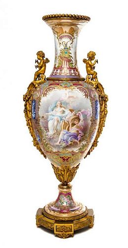 A Sevres Gilt Bronze Mounted Porcelain Urn Height 36 inches.