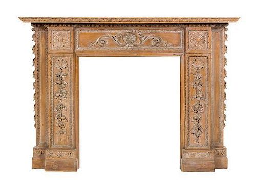 * An English Carved Fireplace Mantle Height 48 3/4 x width 67 1/4 x depth 10 inches.