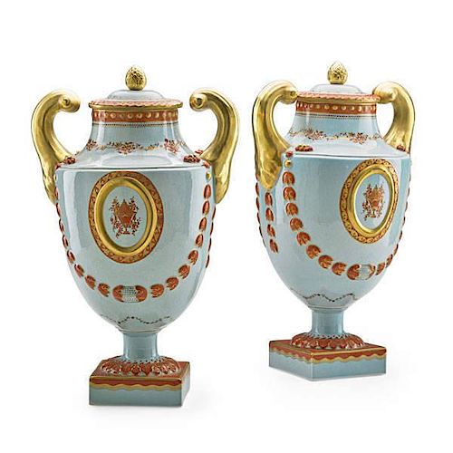 PAIR OF MOTTAHEDEH PORCELAIN COVERED URNS
